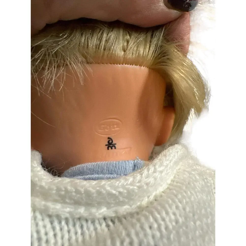 This Gotz doll is a beautiful vintage toddler baby with blonde straight hair and